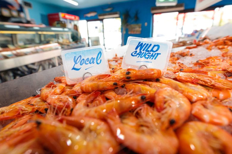 Fresh wild-caught local prawns on ice at a Northern Rivers seafood in Ballina